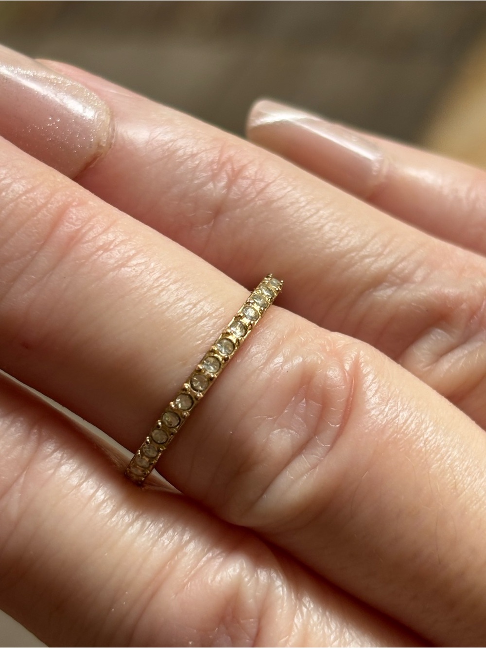 Delicate Gold Tone Eternity Band with Clear Stones